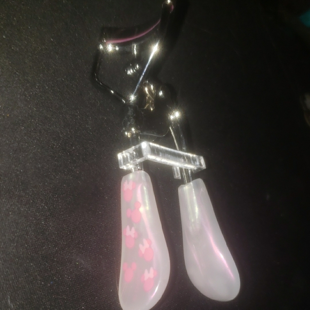 Stylish Silver Eyelash Curler with Pink Accents